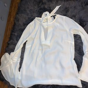 White casual blouse, ties in the back of the neck